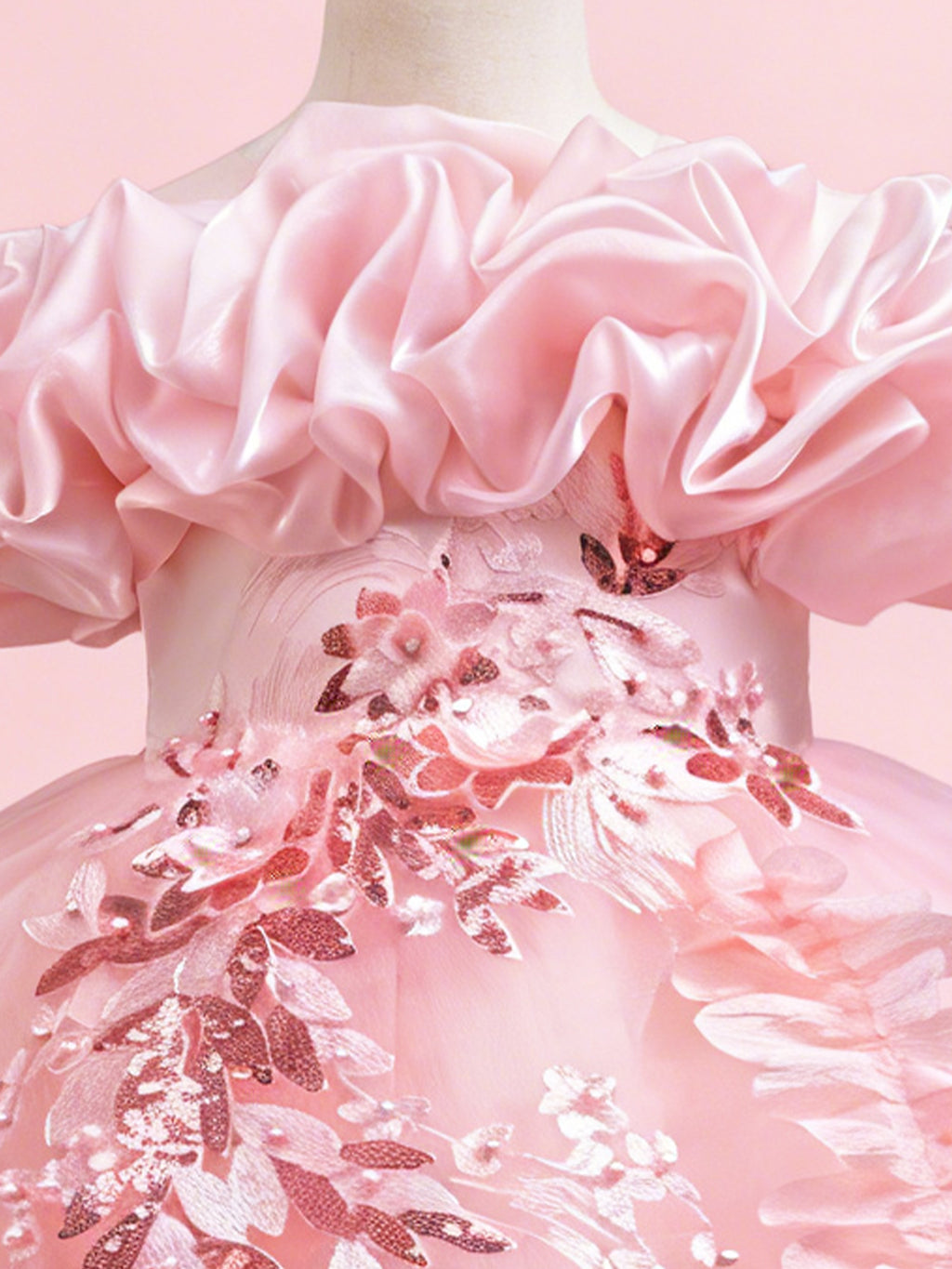 Blisseven blush pink princess dress close up with 3D floral ruffle neckline
