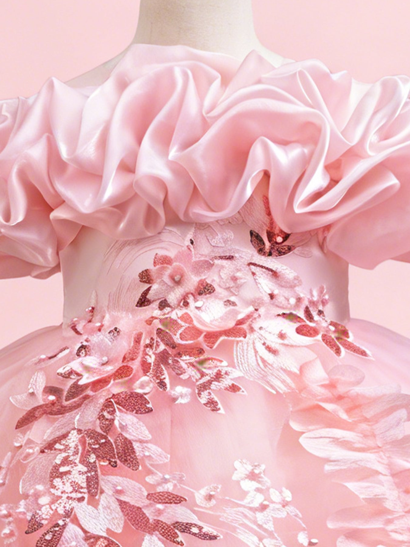 Blisseven blush pink princess dress close up with 3D floral ruffle neckline