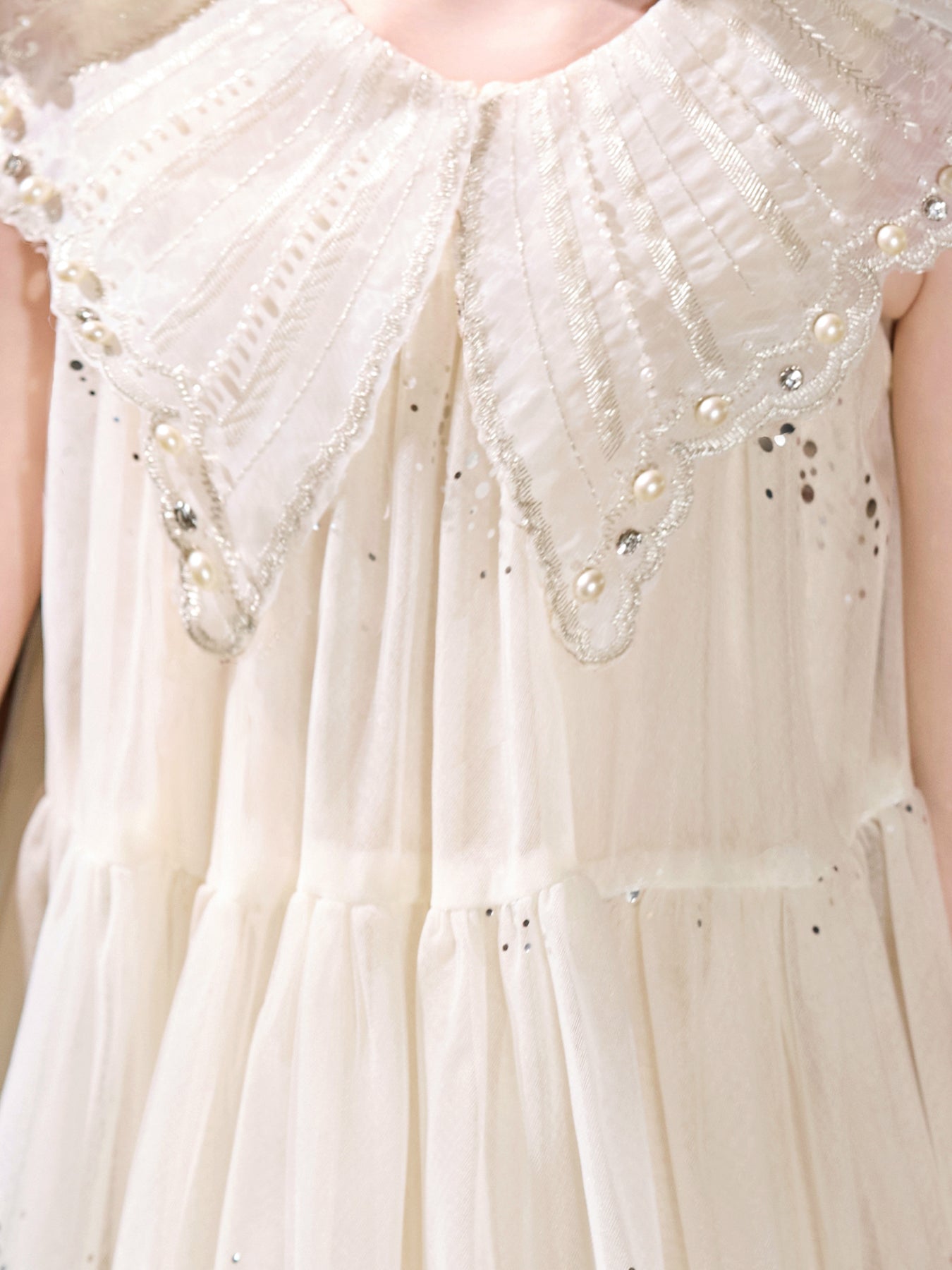 Blisseven ivory girls dress close up with pearl collar details