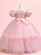 Blisseven pink girls party dress back view showing the statement bow and zipper closure