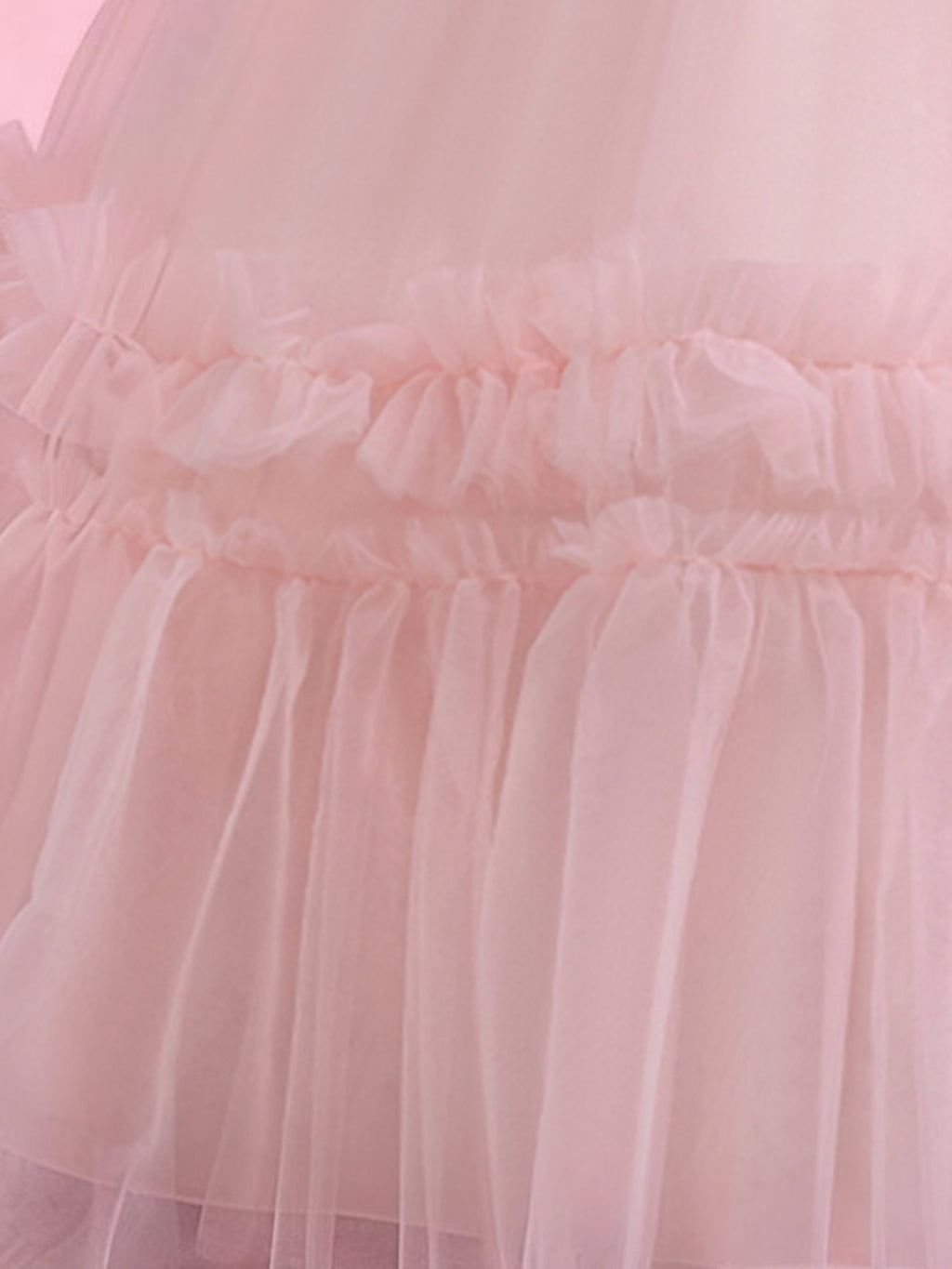 Blisseven pink girls party dress close-up of the tulle skirt and ruffle accents