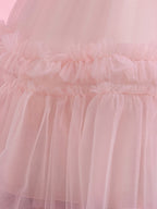 Blisseven pink girls party dress close-up of the tulle skirt and ruffle accents