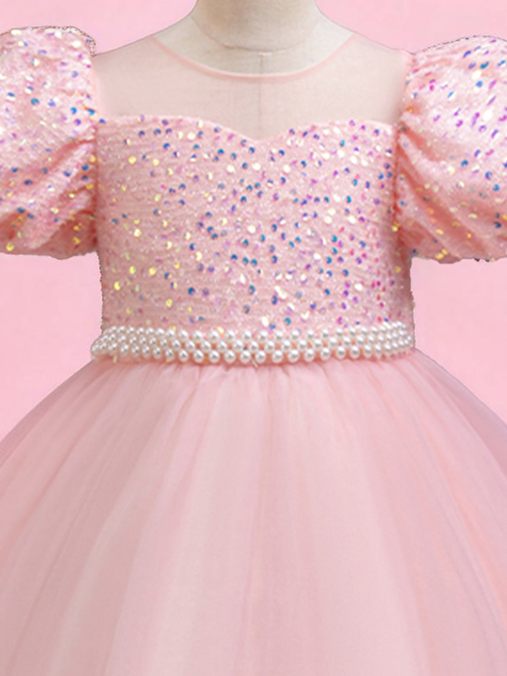 Blisseven pink girls party dress close-up of the sequin bodice and decorative waist trim
