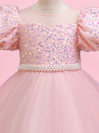 Blisseven pink girls party dress close-up of the sequin bodice and decorative waist trim