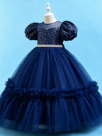 Blisseven sky blue girls party dress angled view showing the puff sleeves and ruffled tulle skirt