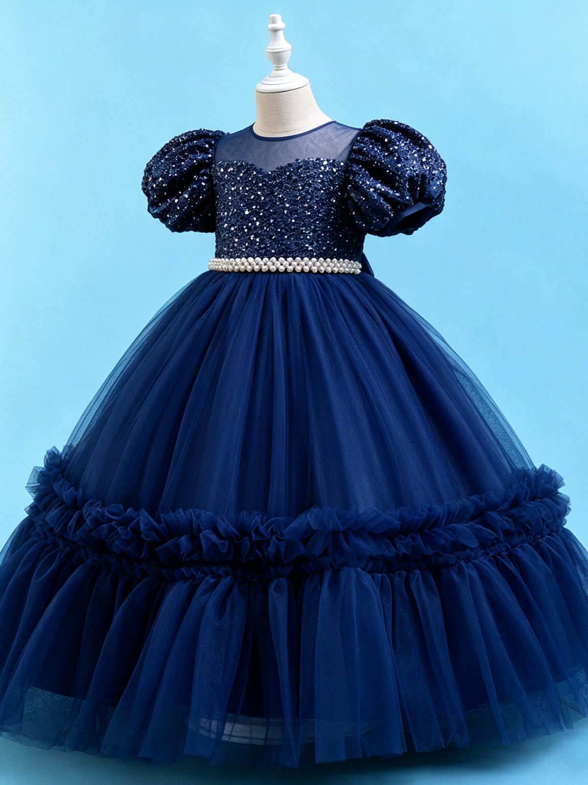 Blisseven sky blue girls party dress angled view showing the puff sleeves and ruffled tulle skirt
