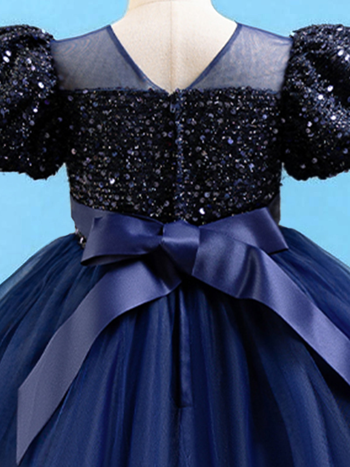 Blisseven sky blue girls party dress close-up of the back bow and sequin bodice