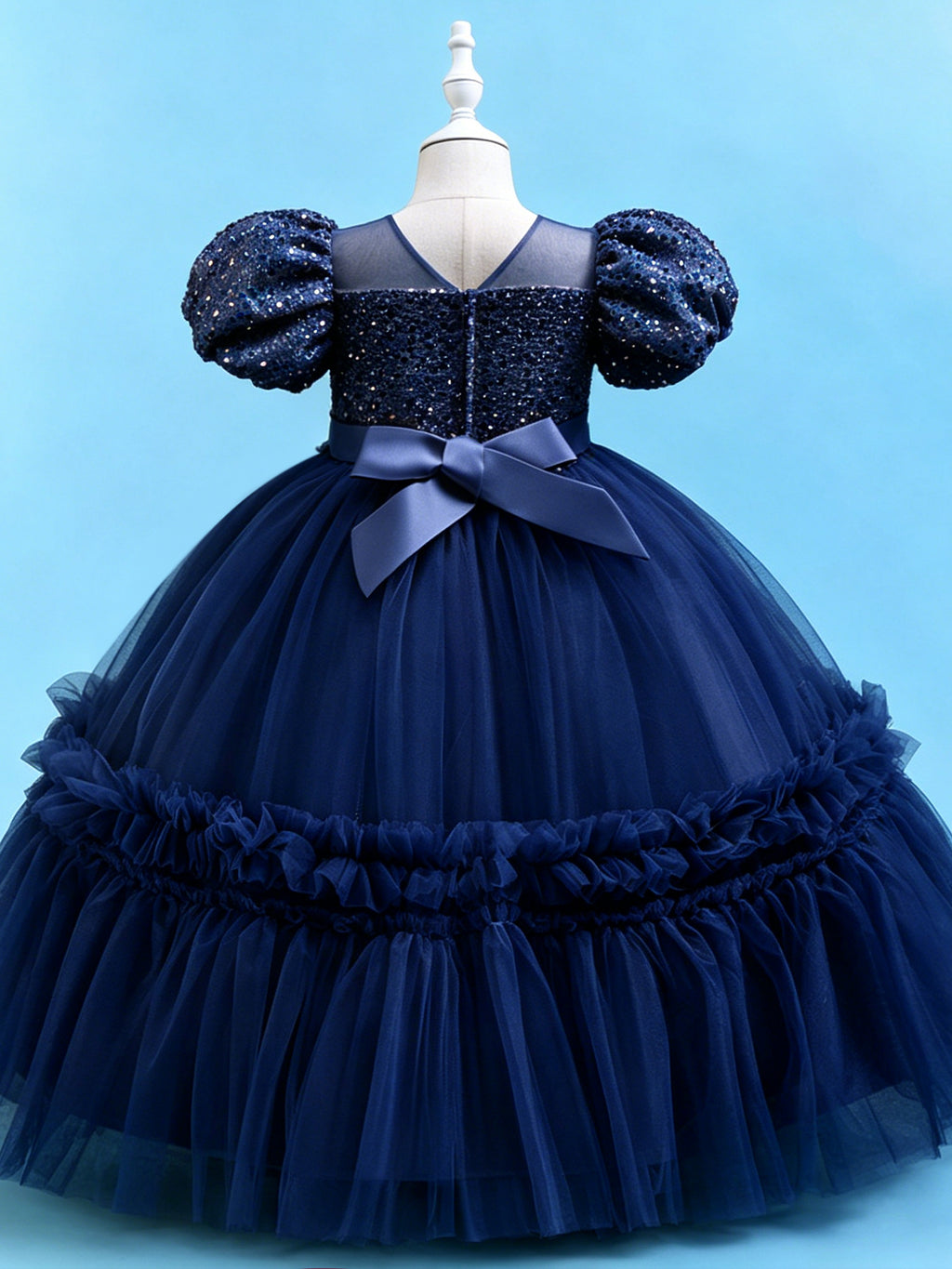 Blisseven sky blue girls party dress back view showing the statement bow and zipper closure