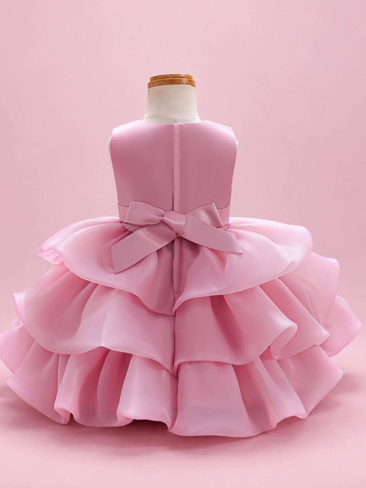 Blisseven LS8609 dusty rose girls organza princess dress back view with satin bodice, back zipper, and bow detail
