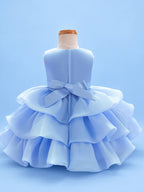 Blisseven LS8609 sky blue girls organza tiered short princess dress back view, featuring a smooth satin bodice, back bow, zipper closure, and layered organza skirt
