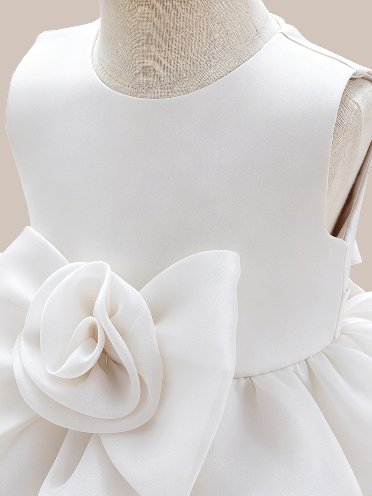 Blisseven LS8609 white girls princess dress bodice detail, showing the smooth sleeveless bodice, waist seam, and large 3D floral decoration