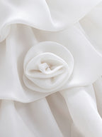 Blisseven LS8609 white girls organza dress skirt flower detail, showing small 3D floral decorations on the layered tiered skirt
