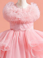 Blisseven pink girls dress close up with soft ruffle neckline details