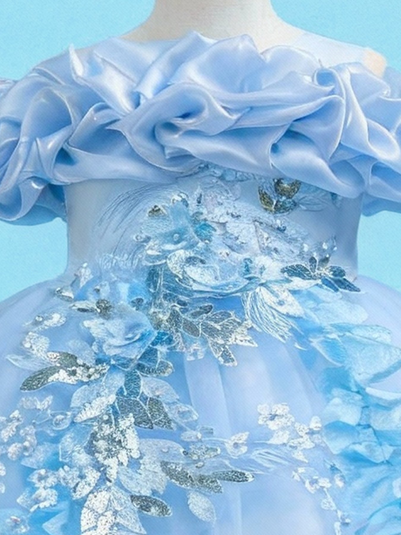 Blisseven sky blue princess dress close up with 3D floral ruffle neckline