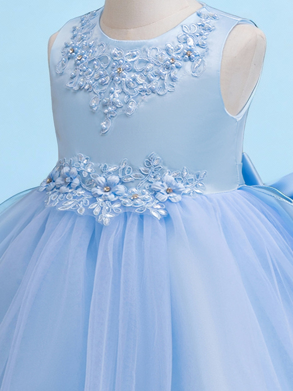 Blisseven sky blue girls dress close up with floral lace bodice details