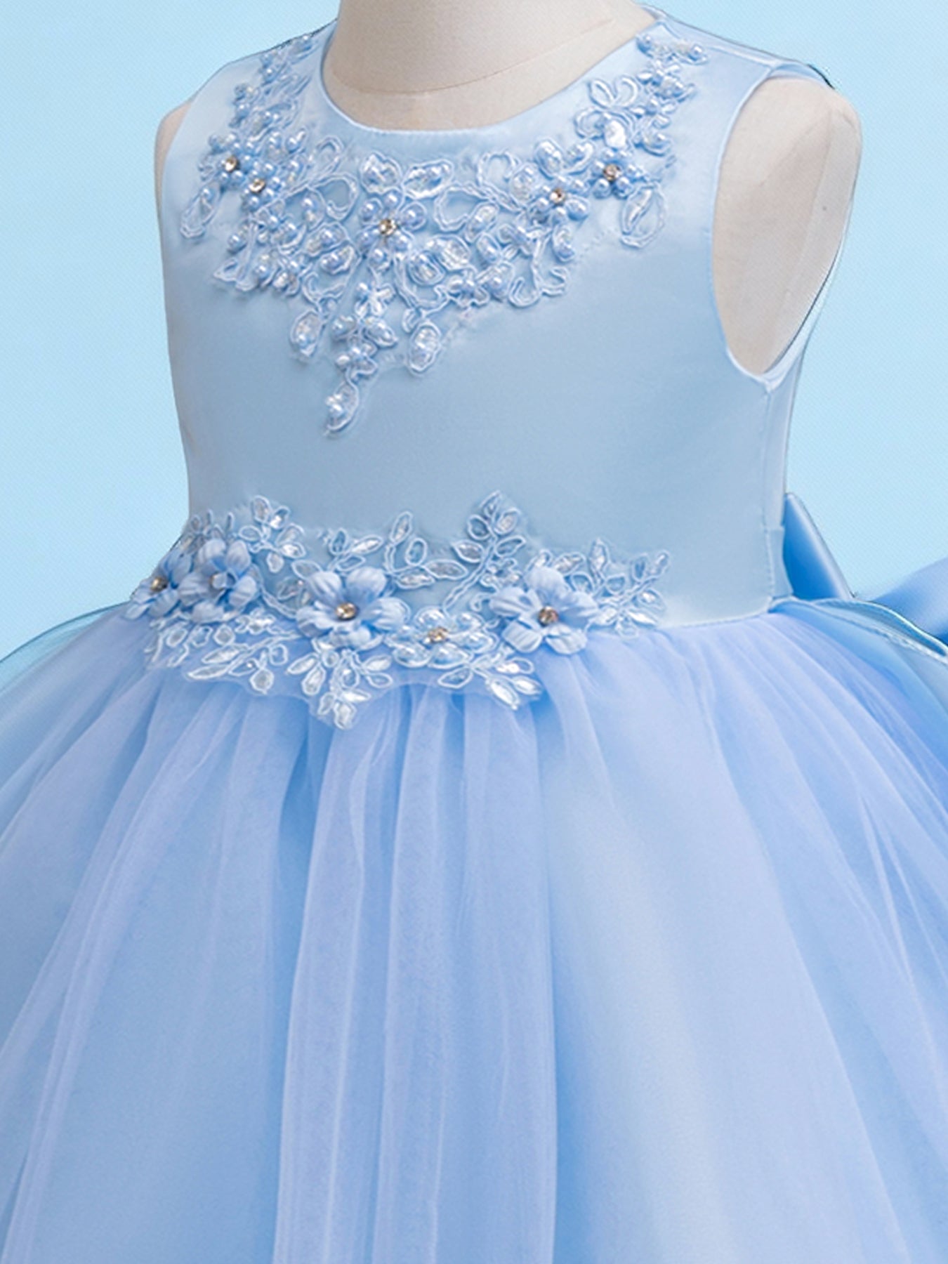 Blisseven sky blue girls dress close up with floral lace bodice details