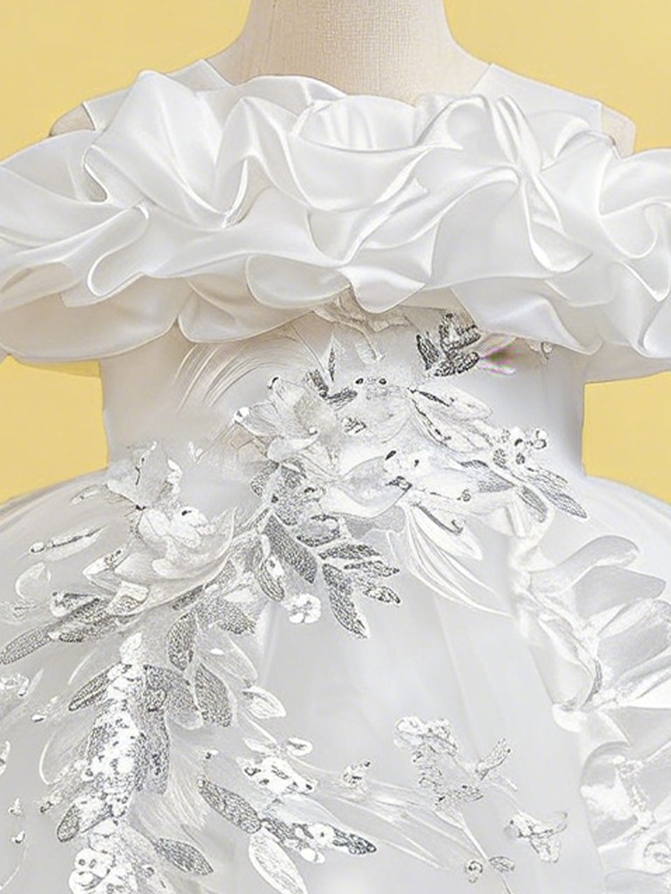Blisseven white princess dress close up with 3D floral ruffle neckline