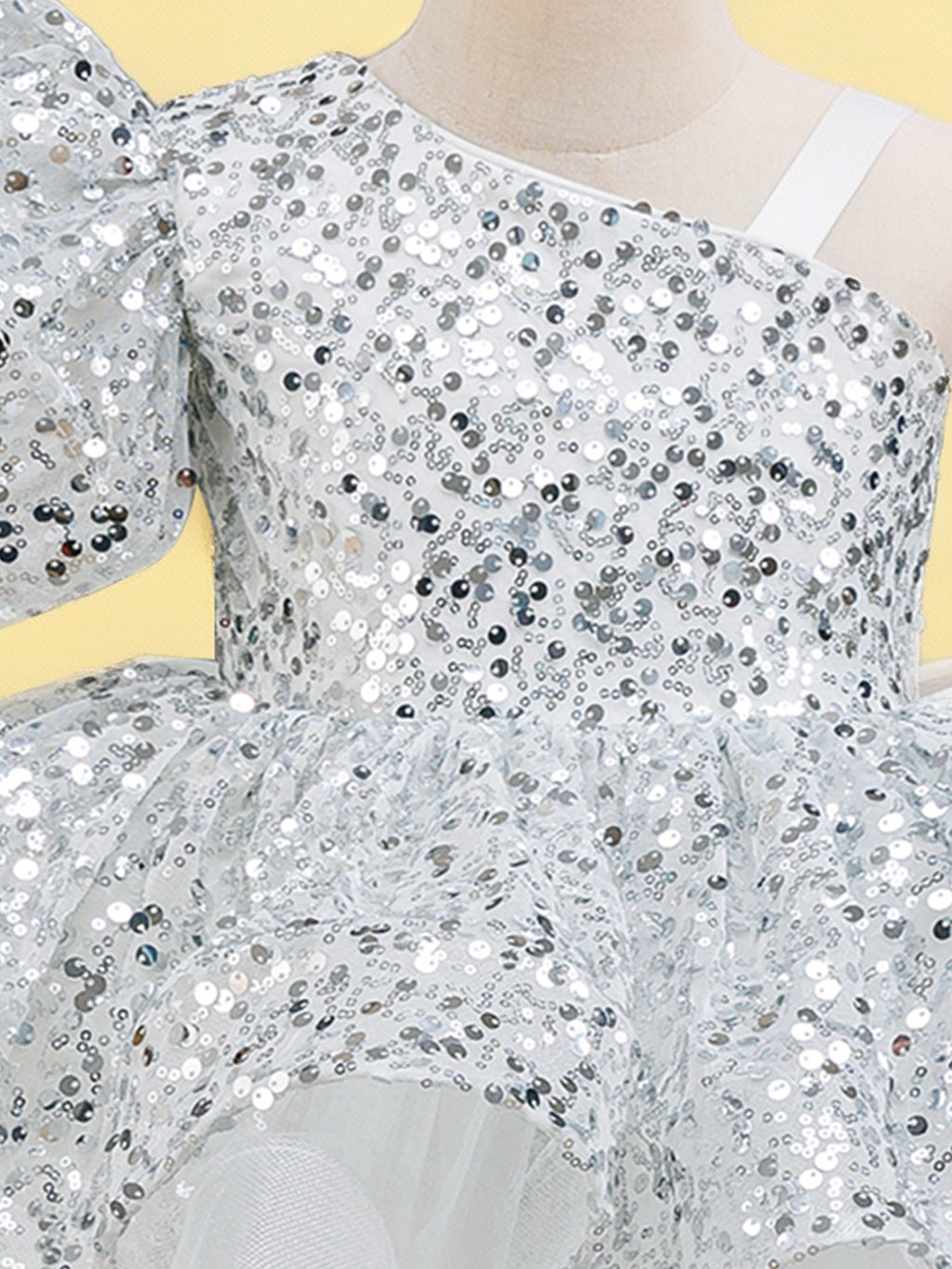 Blisseven white girls dress close up with one shoulder puff sleeve detail