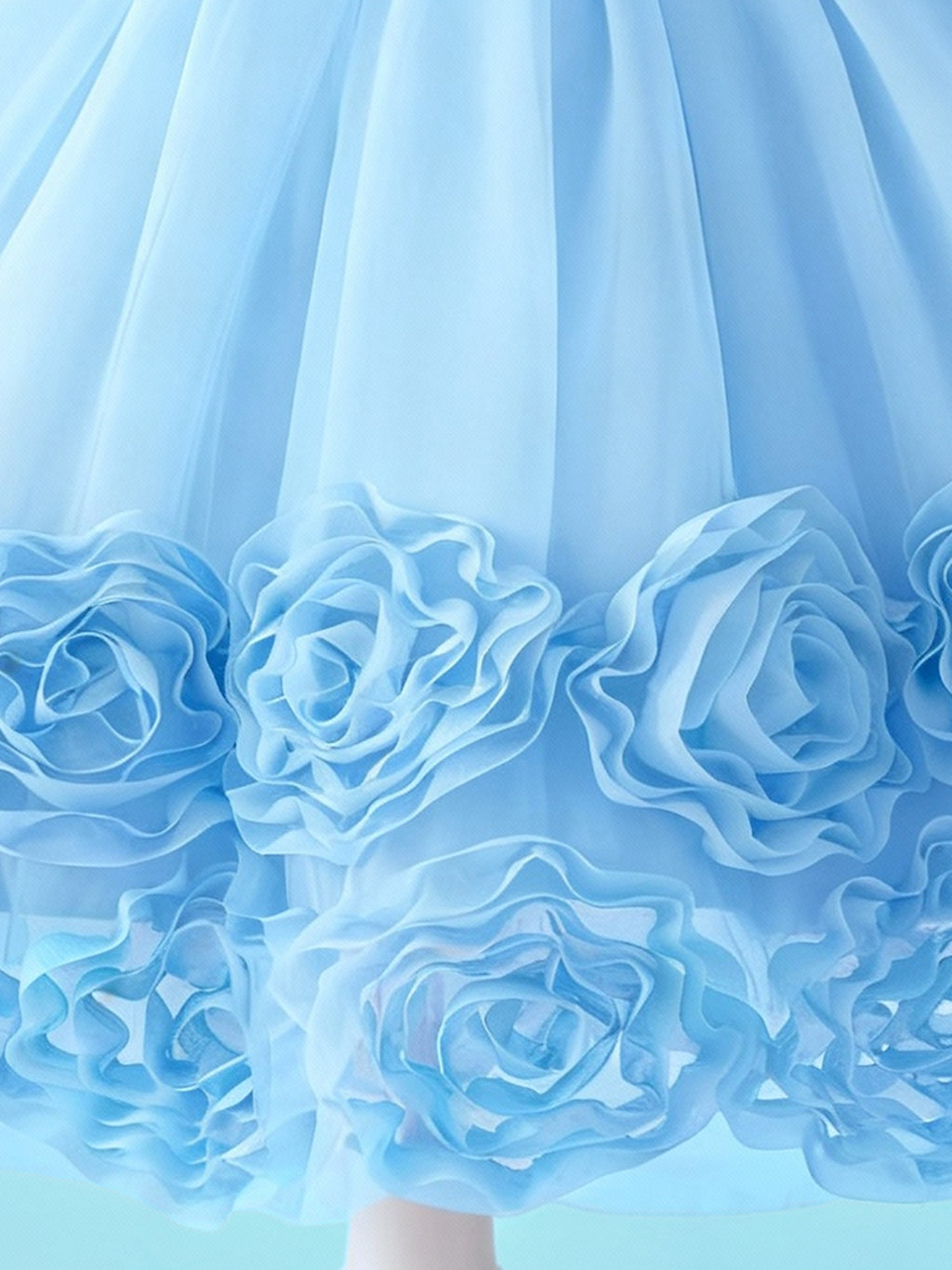 Sky blue sequin bodice and bow waist detail on girls princess dress
